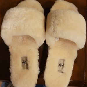 Cream fuzzy slides